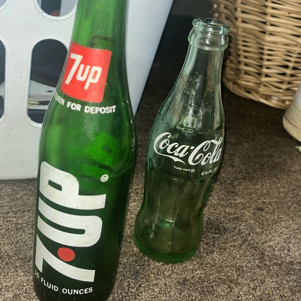 vintage glass bottles of coca cola and 7 up